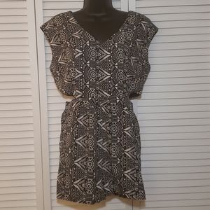 Romper with side cutouts.